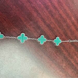 Elegant Silver and Green Clover Bracelet